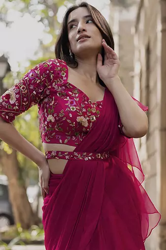 Pink organza plain saree with embroidered blouse & belt