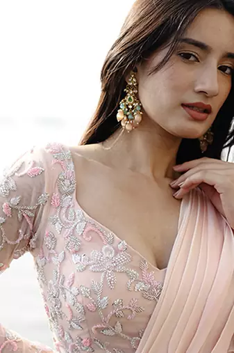 Pink organza plain saree with embroidered blouse & belt