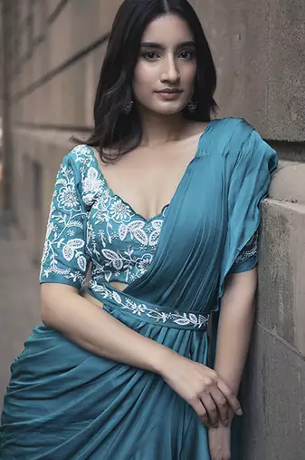Blue satin plain saree with embroidered blouse & belt