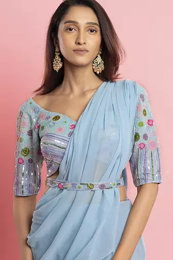 Light blue georgette plain saree with embroidered blouse & belt