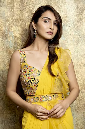 Yellow organza plain saree with embroidered blouse & belt