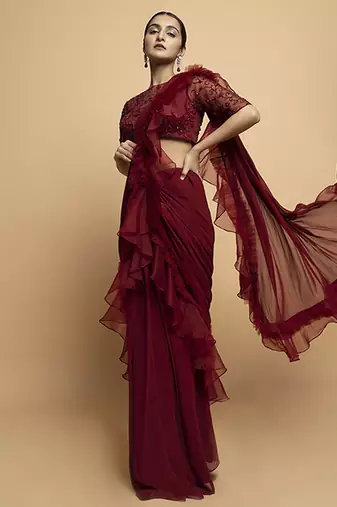 Maroon organza plain saree with embroidered blouse & belt