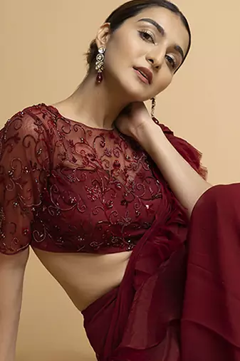 Maroon organza plain saree with embroidered blouse & belt