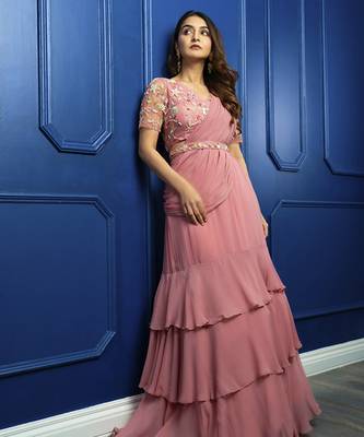 Pink georgette plain saree with embroidered blouse & belt 3