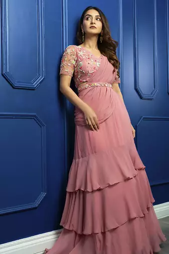 Pink georgette plain saree with embroidered blouse & belt