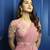 Pink georgette plain saree with embroidered blouse & belt