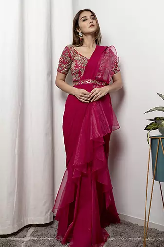Pink organza plain saree with embroidered blouse & belt