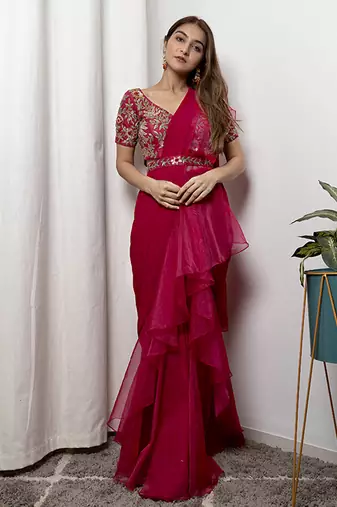 Pink organza plain saree with embroidered blouse & belt