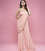 Pink chiffon plain saree with embroidered blouse