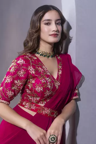 Pink organza plain saree with embroidered blouse & belt