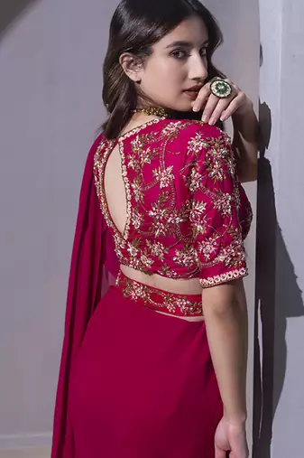 Pink organza plain saree with embroidered blouse & belt