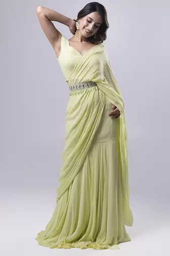 Green georgette plain saree with embroidered blouse & belt