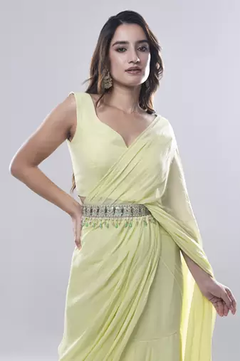 Green georgette plain saree with embroidered blouse & belt