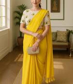 Yellow khadi cotton plain saree with stiched blouse