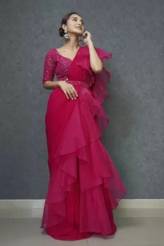 Pink organza plain saree with embroidered blouse & belt