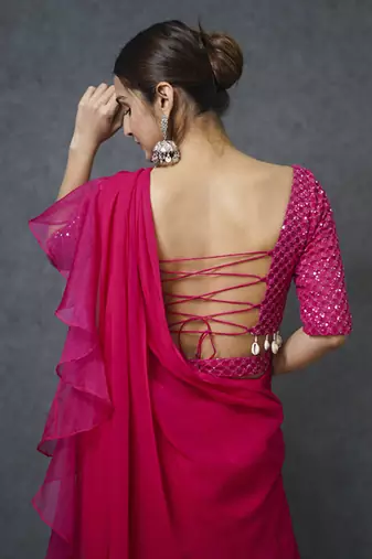 Pink organza plain saree with embroidered blouse & belt