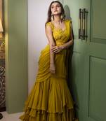 Yellow organza plain saree with embroidered blouse & belt