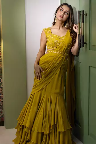 Yellow organza plain saree with embroidered blouse & belt