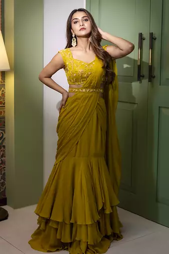 Yellow organza plain saree with embroidered blouse & belt