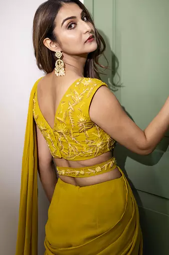 Yellow organza plain saree with embroidered blouse & belt