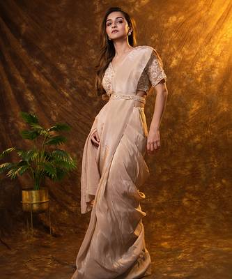 Beige tissue plain saree with embroidered blouse & belt 1
