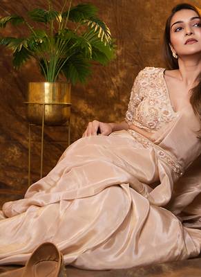 Beige tissue plain saree with embroidered blouse & belt 5