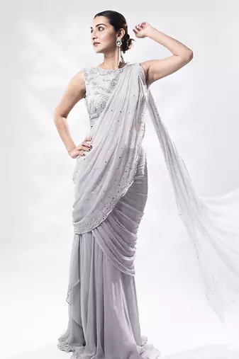 Lilac georgette plain saree with embroidered blouse
