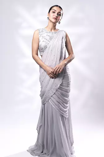 Lilac georgette plain saree with embroidered blouse