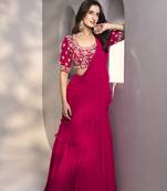 Pink georgette plain saree with embroidered blouse & belt