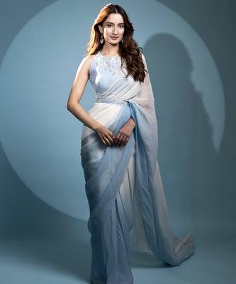 Light blue organza plain saree with embroidered blouse & belt 1