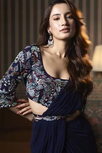 Navy blue georgette plain saree with embroidered blouse & belt