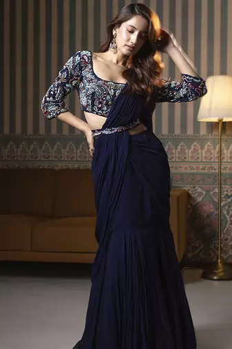 Navy blue georgette plain saree with embroidered blouse & belt