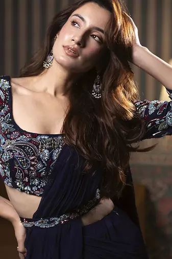 Navy blue georgette plain saree with embroidered blouse & belt