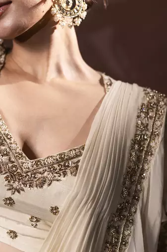 White organza plain saree with embroidered blouse
