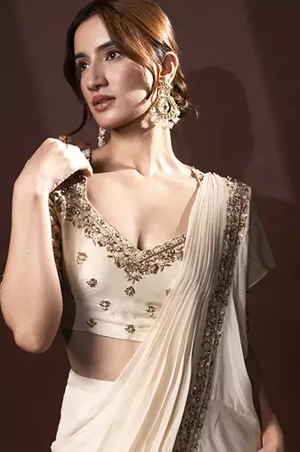 White organza plain saree with embroidered blouse