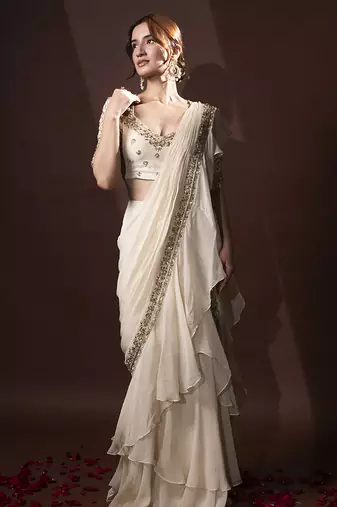 White organza plain saree with embroidered blouse