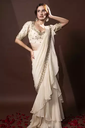 White organza plain saree with embroidered blouse