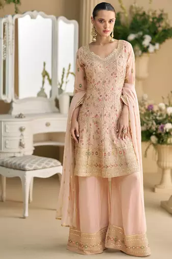 heavy wedding wear pink georgette peplum style suit for women