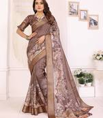 Primarily brown soft tissue silk floral digital printed saree with zari jacquard weaving border