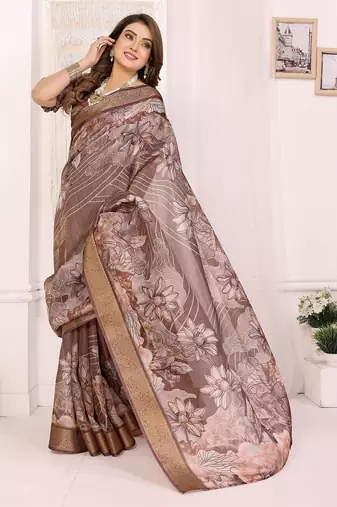 Primarily brown soft tissue silk floral digital printed saree with zari jacquard weaving border