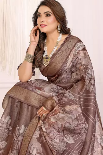 Primarily brown soft tissue silk floral digital printed saree with zari jacquard weaving border