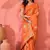 Orange silk blend jacquard saree with unstitched blouse piece