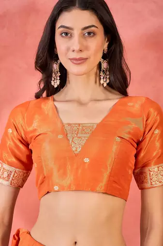 Orange silk blend jacquard saree with unstitched blouse piece