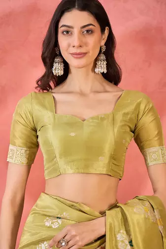 Yellow silk blend jacquard saree with unstitched blouse piece