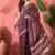 Purple organza jacquard saree with unstitched blouse piece