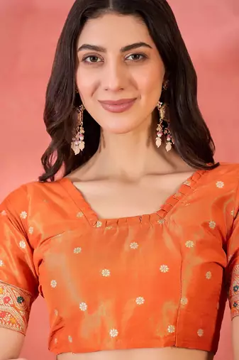 Orange silk blend jacquard saree with unstitched blouse piece