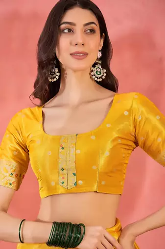 Yellow silk blend jacquard saree with unstitched blouse piece