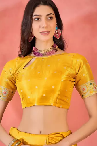 Yellow silk blend jacquard saree with unstitched blouse piece