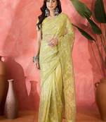 Yellow net sequins work saree with unstitched blouse piece