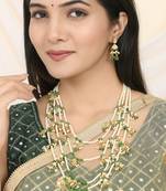 Layered green beaded kundan pearl necklace set